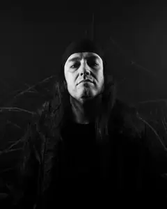 Retrato a preto e branco de Butch Cid